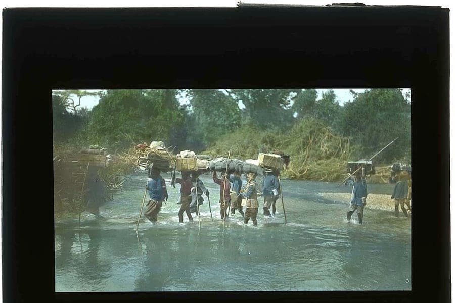 Porters moving luggage