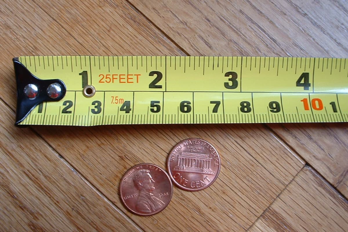 A tape measure marked in inches and centimeters
