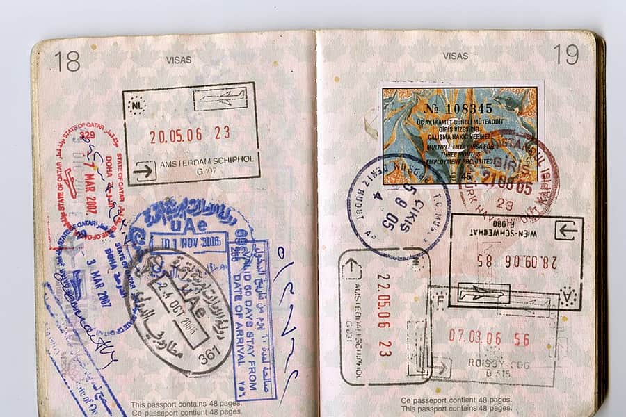Passport pages covered in entry stamps