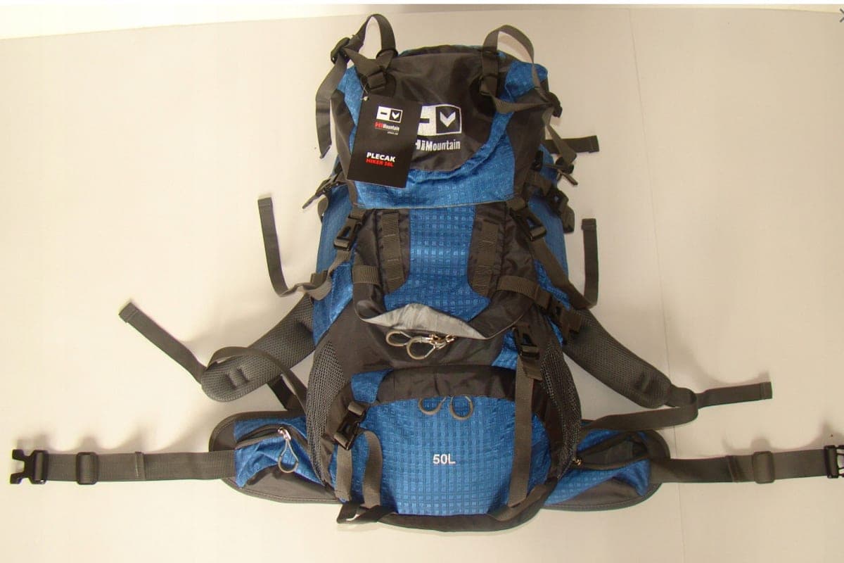 A large hiking-style backpack standing upright against a plain background