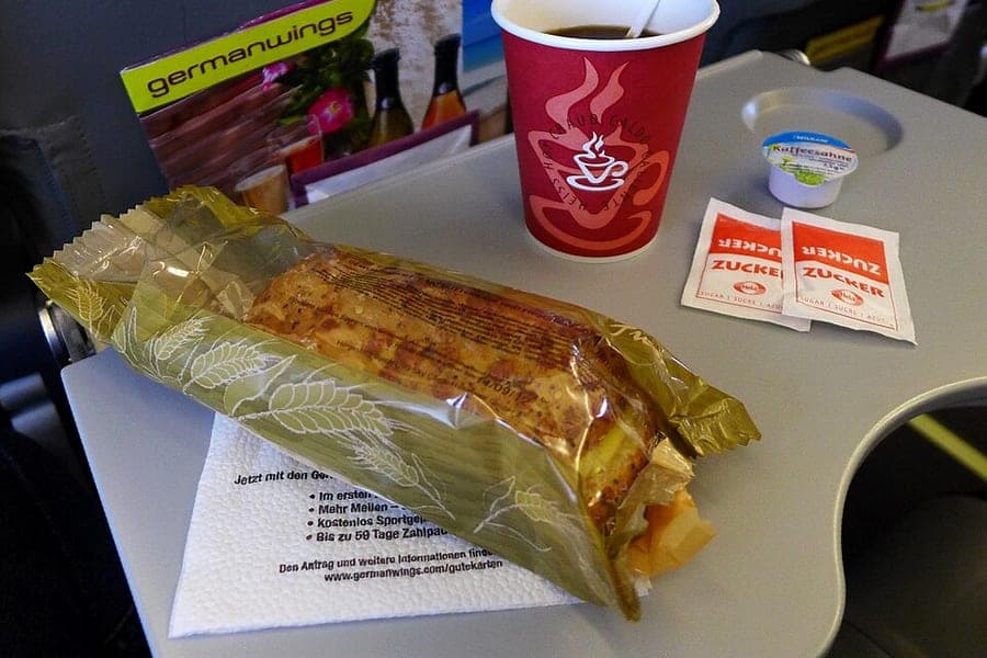 An in-flight snack served on a tray