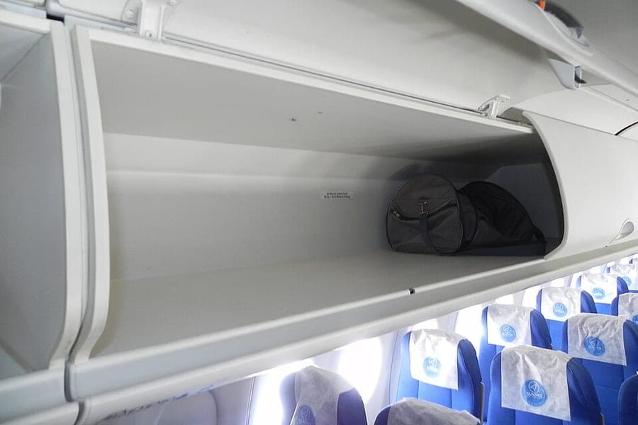 Open overhead bins inside an aircraft cabin