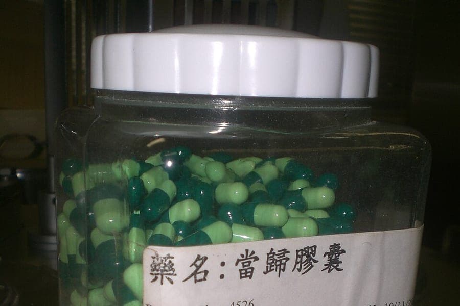 Capsules and tablets in a pharmacy laboratory