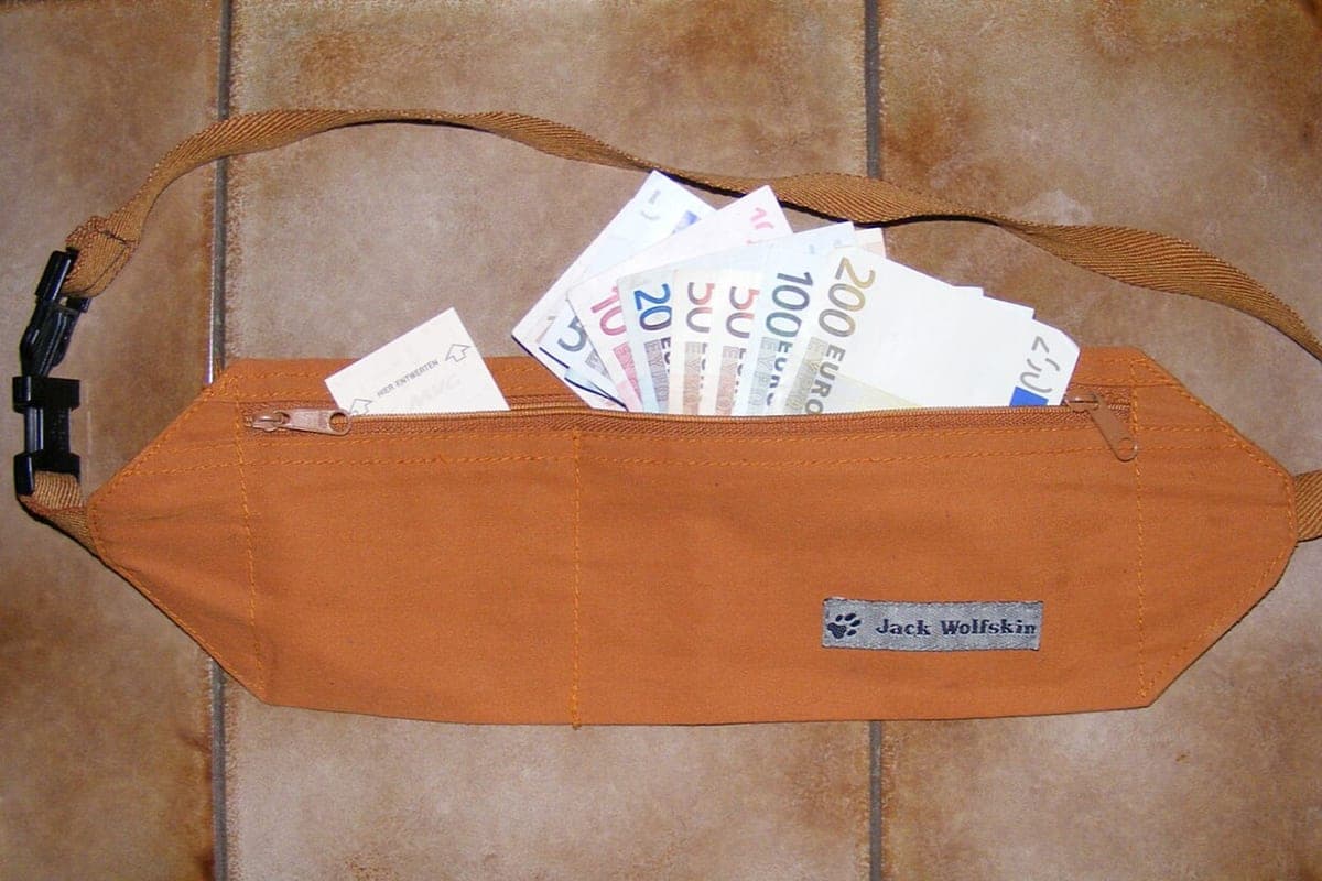 A flat fabric pouch worn under clothing