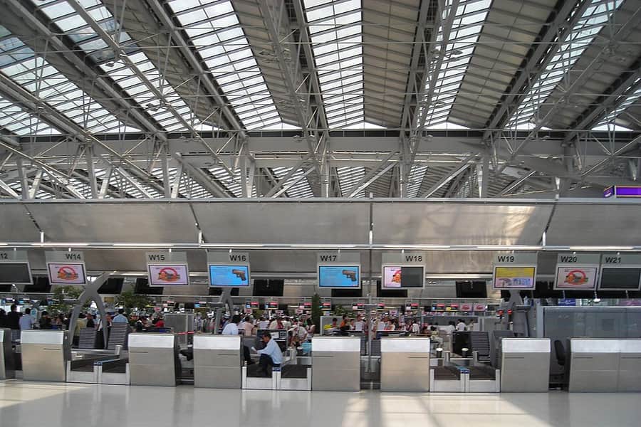 A row of airline check-in counters