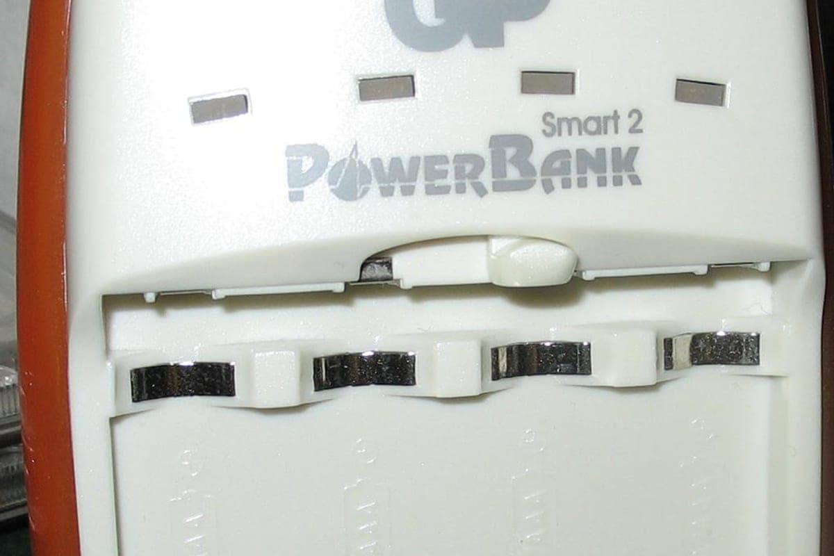 A portable power bank with its battery cover open