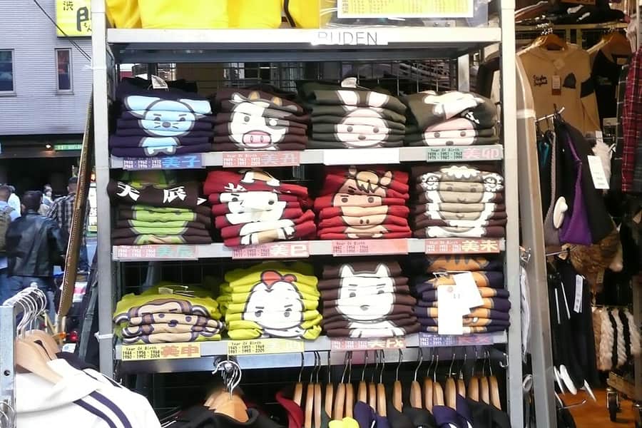 A stack of neatly folded t-shirts