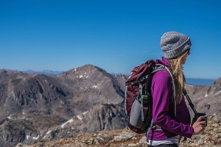 A traveler carrying a backpack