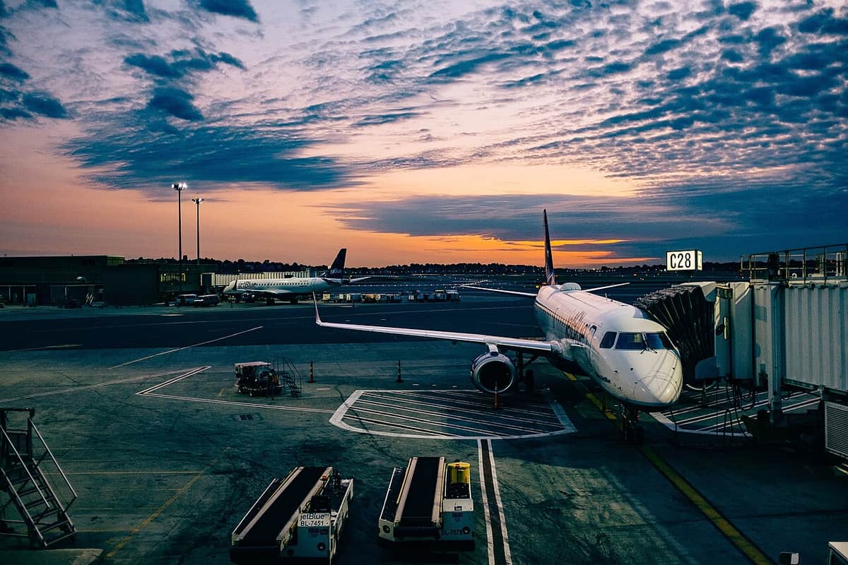 An airport concourse in the evening